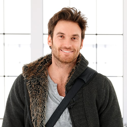 bigstock-Trendy-young-man-at-home-smil-52362661.jpg